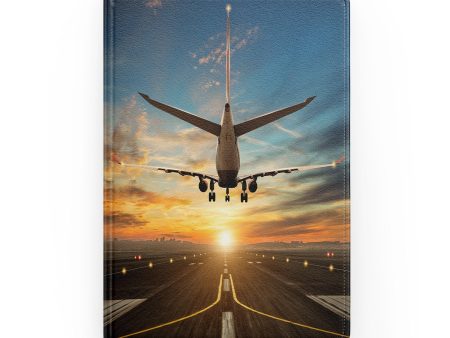 Airplane over Runway Towards the Sunrise Designed Notebooks For Sale